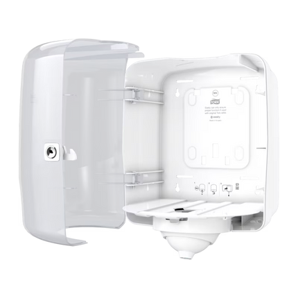 Interiorul dispenserului tork cu manual de instructiuni